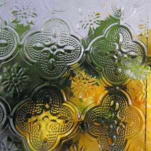 CLEAR A TINTED PATTERNED GLASS