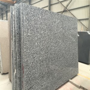 Nastříkejte bílou žulovou desku z mořské vlny